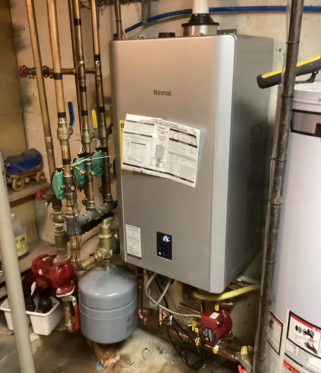 Gering Valley technician servicing a residential boiler system in the Nebraska Panhandle