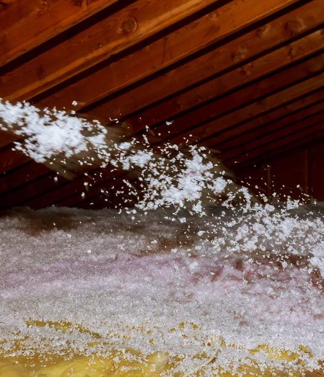 Blown-in attic insulation installed by Gering Valley Plumbing & Heating